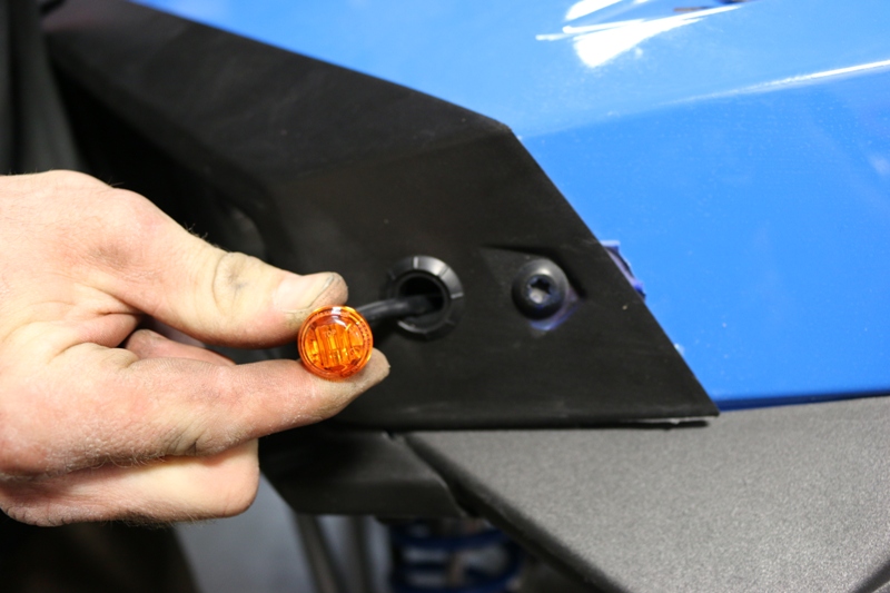 4. To install remove rubber grommet from around the LED light and